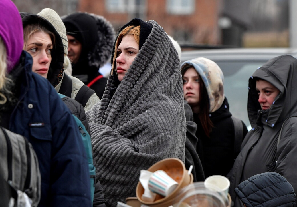 Ucraina, i volti dei profughi che cercano la fuga in Polonia
