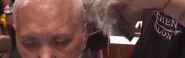Copertina: India, gli esuli tibetani si radono la testa per protesta